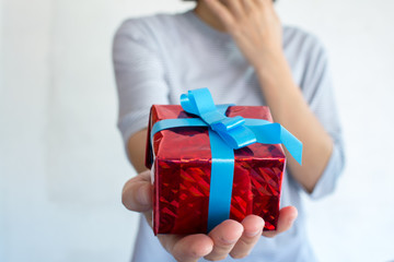 Blurred of Asian woman is holding valentine's gift box