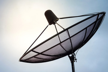 A satellite dish on the sky background