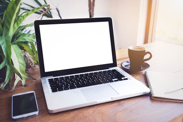 Fototapeta premium laptop on table. In the coffee shop.