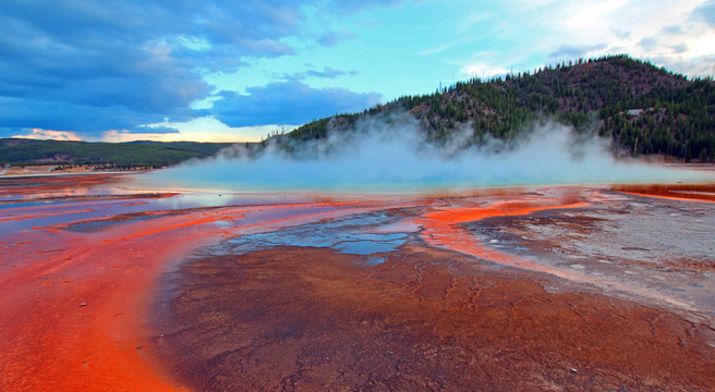 The Grand Prismatic Spring at sunset in the Midway Geyser Basin in Yellowstone National Park in Wyoming USA