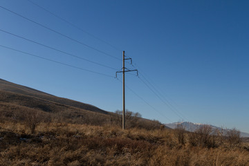transmission tower in the foothills