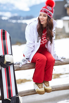 woman winter outdoor snowboarding concept.