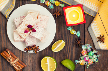 Delight, or Lokum - sweetness of sugar flour, with addition starch, and nuts. The most common Turkish , which is now referred to simply as .Wooden background. Top view