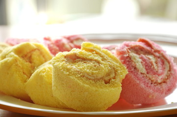 mini vanilla and strawberry cake roll fit for one piece on plate