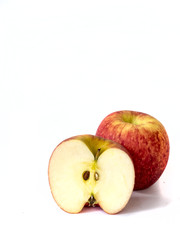 red fuji apple with half slice ,isolated on white
