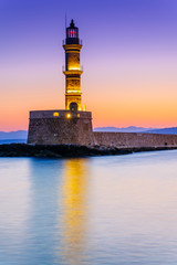 Venetian lighthouse in Chania port at sunrise, Crete, Greece - 132306045