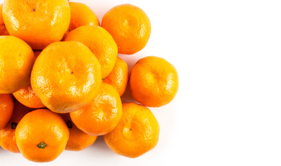 Ripe mandarines  close-up on a white background. 