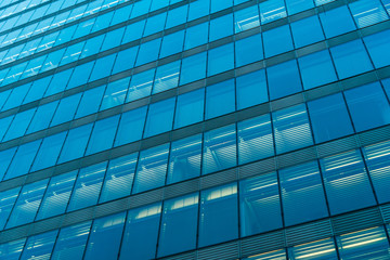 Fototapeta na wymiar blue colored glass facade
