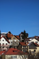 Mountain pensions facades in Busteni mountain resort in Romania