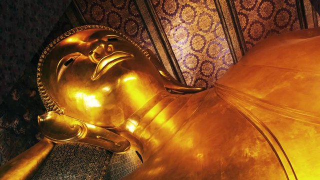Reclining buddha in Wat Pho is very famous landmark of Bangkok