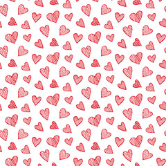 Obraz premium Vector romantic seamless pattern with hand drawn red heart doodles