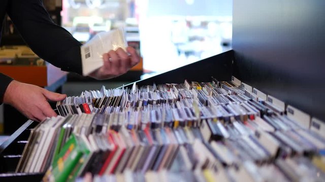 Closeup of browsing records in the vinyl record store