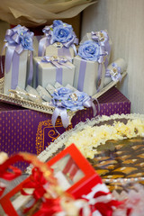 Gift chocolate boxes and ribbon for wedding concept, vertical