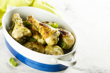 Baked chicken legs with pesto and buttermilk