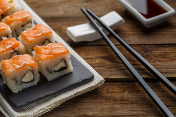 Delicious fresh rolls with salmon closeup