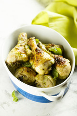 Baked chicken legs with pesto and buttermilk