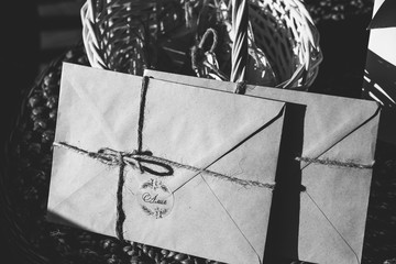 Old paper letter send in creative envelope to the post, black and white