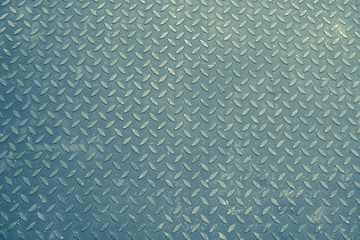 Footpath patterns on the steel texture grunge background. (vintage style) 