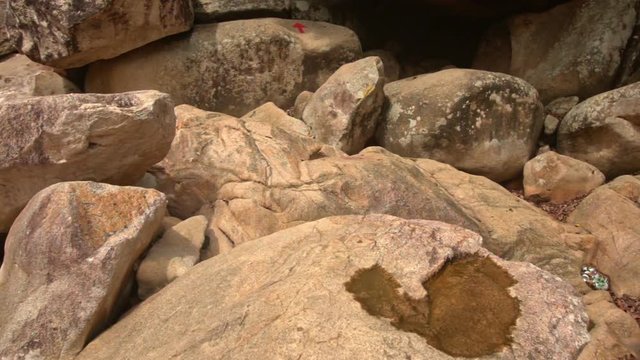Large Brown Boulders on Mountain River in Park