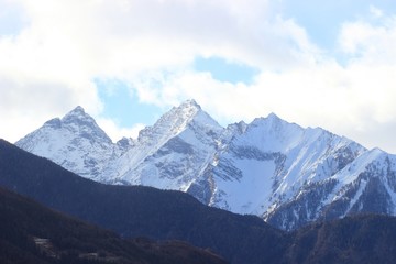 Alpine peaks in winter sunny day 