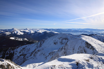 The slopes of the mountains lit by the sun that rises. Carpathians.