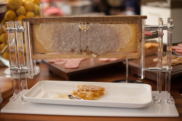 Setting of the table with food for breakfast, beverage in buffet, honey