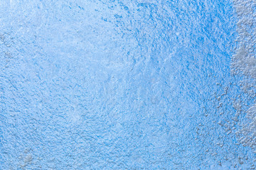 Fototapeta na wymiar Frozen ice pattern on glass