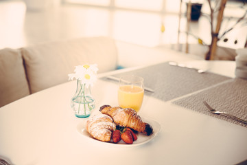 Setting of objects in the cafe, details, breakfast, juice, shallow focus, vintage