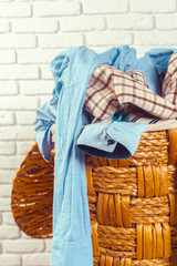Clothes in wooden basket