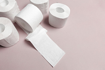 Toilet paper on pink background