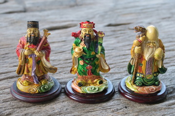 Three gods of Chinese and nature background. Hock Lok Xiu gods of Chinese on table