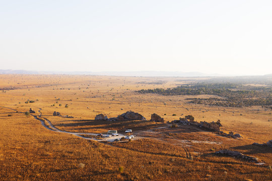 Tourists at Fenetre d'Isalo (the window of Isalo), Isalo National Park, central area, Madagascar