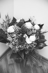 Bouquet of white and red roses for engagement and wedding for bride, black and white