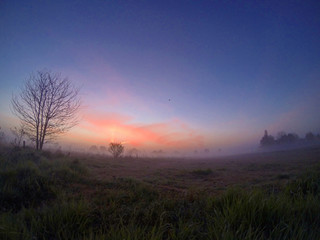 Fototapeta na wymiar Dramatic countryside sunrise