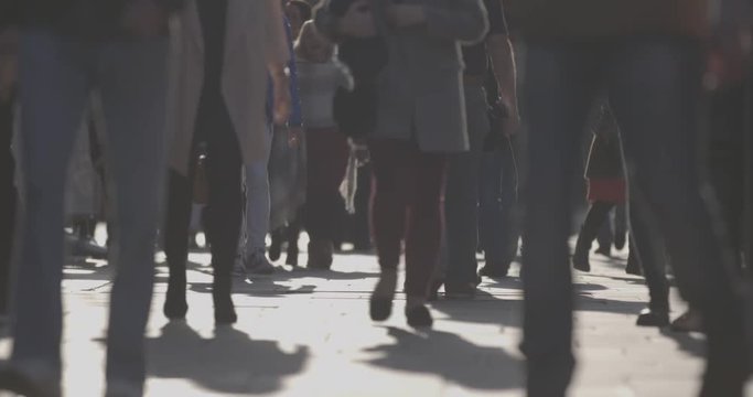 4K Anonymous pedestrians on high street. 