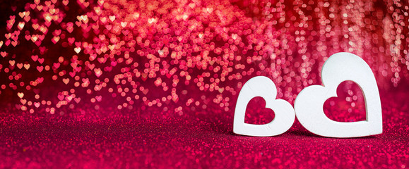 Valentines Day - Wooden Hearts On Red Shiny Background