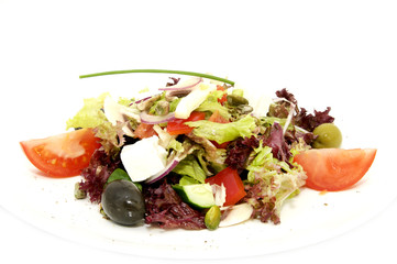 Greek salad on a table in a restaurant