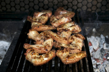 Cooking chicken wings grilled