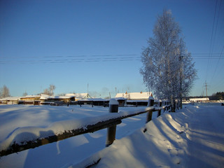 Naklejka premium Зимний деревенский пейзаж