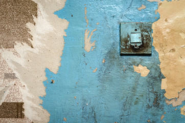 old light switch on shabby wall. Abstract background
