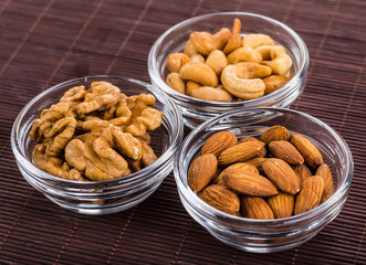Nuts mix in a wooden plate
