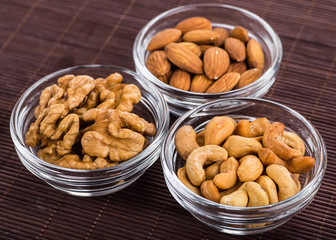 Nuts mix in a wooden plate