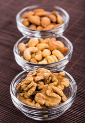 Nuts mix in a wooden plate