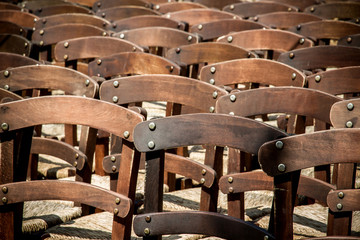 Many empty chairs waiting as background