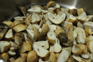cut mushrooms in big pot