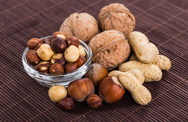 Nuts mix in a wooden plate