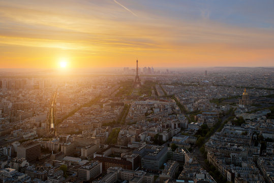 Aerial view of Paris skyline with Eiffel Tower at sunset in Pari
