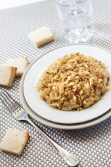 Fried cabbage with caraway and garlic on a plate