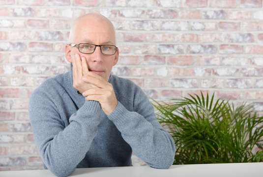 Handsome Mature Man With Blue Pullover