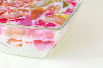 glass of gelatin with condensed milk for desert, left view